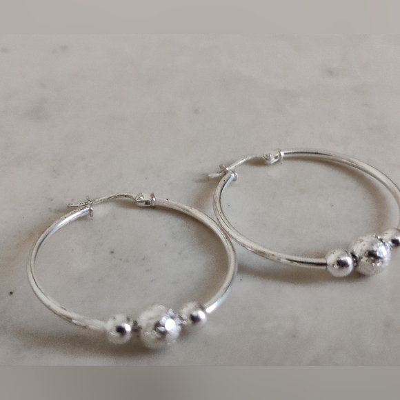 Sterling Silver Hoops Earrings with Orbits - Picture 9 of 16